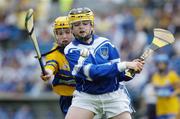 16 May 2004; Marie Russell, Waterford, in action against Evelyn Glynn, Clare. Primary Game, Clare v Waterford, Semple Stadium, Thurles, Co. Tipperary. Picture credit; Ray McManus / SPORTSFILE