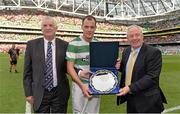 10 August 2013; Glasgow Celtic XI captain Anthony Stokes is presented with the winning trophy by Minister of State with responsibility for Tourism and Sport, Michael Ring T.D. and Tony Fitzgerald, Vice President of the FAI. Dublin Decider, Liverpool XI v Glasgow Celtic XI, Aviva Stadium, Lansdowne Road, Dublin. Picture credit: Brendan Moran / SPORTSFILE