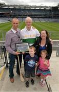 10 August 2013;  William and Claire Peters, from Clonmel, Co. Tipperary, with Paul, 6 years, and Darcy Colleran, 4 years, from Whitehall, Dublin, and Tipperary’s All-Ireland winning captain from 2001, Tommy Dunne, who was the latest to feature on the Bord Gáis Energy Legends Tour Series 2013 when he gave a unique tour of the Croke Park stadium and facilities this week. Full details and dates for the Bord Gáis Energy Legends Tour Series 2013 are available on www.crokepark.ie/events. Croke Park, Dublin. Picture credit: Ray McManus / SPORTSFILE