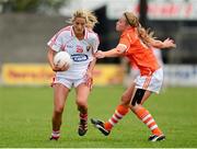 10 August 2013; Juliet Murphy, Cork, in action against Caroline O'Hare, Armagh. TG4 All-Ireland Ladies Football Senior Championship, Round 2, Qualifier, Armagh v Cork, St. Brendan’s Park, Birr, Co. Offaly. Photo by Sportsfile