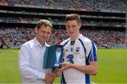 11 August 2013; Austin Gleeson, Waterford, is presented with the Electric Ireland Man of the Match award by Jim Dollard, Executive Director Electric Ireland. Electric Ireland GAA Hurling All-Ireland Minor Championship Semi-Final, Kilkenny v Waterford, Croke Park, Dublin. Picture credit: Ray McManus / SPORTSFILE