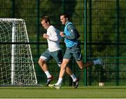 11 August 2013; Republic of Ireland's John O'Shea and Glenn Whelan in action during squad training ahead of their international friendly match against Wales on Wednesday. Republic of Ireland Squad Training, Spytty Park, Newport, Wales. Picture credit: David Maher / SPORTSFILE