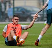 12 August 2013; Republic of Ireland's Robbie Brady gets a helping hand from team-mate James McClean during squad training ahead of their international friendly against Wales on Wednesday. Republic of Ireland Squad Training, Spytty Park, Newport, Wales. Picture credit: David Maher / SPORTSFILE