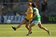 13 August 2022; Cathy Carey of Antrim in action against Cliodhna Mc Elroy of Fermanagh during the TG4 All-Ireland Ladies Junior Football Championship Final Replay between Antrim and Fermanagh at the Athletic Grounds, Armagh. Photo by Oliver McVeigh/Sportsfile