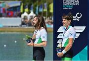 14 August 2022; Paul O'Donovan, left, and Fintan McCarthy of Ireland stand for Amhrán na bhFiann after receiving their gold medals for winning the Men's Lightweight Double Sculls A Final during day 4 of the European Championships 2022 at Olympic Regatta Centre in Munich, Germany. Photo by Ben McShane/Sportsfile