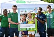 13 August 2022; Community games ambassadors, from left, Adeyemi Talabi, Oisin Joyce, Jesse Osas and Conor Cusack, with Saerlaith and Sadhbh Dillon, from Ballaghaderreen, Roscommon, during the Aldi Community Games National Track and Field Finals that attract over 2,000 children to SETU Carlow Sports Campus in Carlow.  Photo by Sam Barnes/Sportsfile