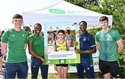 13 August 2022; Community games ambassadors, from left, Oisin Joyce, Adeyemi Talabi, Jesse Osas and Conor Cusack, with Emily Gately from  Kilteevan, Roscommon, during the Aldi Community Games National Track and Field Finals that attract over 2,000 children to SETU Carlow Sports Campus in Carlow.  Photo by Sam Barnes/Sportsfile