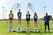 13 August 2022; Community Games ambassador Jesse Osas, right, with girls 200m U16 & O14 medallists, Daisy Walker from Monaghan-Town, Monaghan, gold, Caoimhe Byrne O’ Connell from Lisdoonvarna, Clare, silver, Niamh Murphy from Cushinstown, Meath, bronze, and Abbie Doherty from Westside, Wicklow, fourth, during the Aldi Community Games National Track and Field Finals that attract over 2,000 children to SETU Carlow Sports Campus in Carlow. Photo by Sam Barnes/Sportsfile