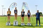 13 August 2022; Community Games ambassador Jesse Osas, right, with girls 200m U16 & O14 medallists, Daisy Walker from Monaghan-Town, Monaghan, gold, Caoimhe Byrne O’ Connell from Lisdoonvarna, Clare, silver, Niamh Murphy from Cushinstown, Meath, bronze, and Abbie Doherty from Westside, Wicklow, fourth, during the Aldi Community Games National Track and Field Finals that attract over 2,000 children to SETU Carlow Sports Campus in Carlow. Photo by Sam Barnes/Sportsfile