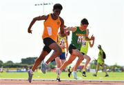 13 August 2022; Finn Barett from Cahersiveen, Kerry, right, competing in the boys 100m U16 & O14 during the Aldi Community Games National Track and Field Finals that attract over 2,000 children to SETU Carlow Sports Campus in Carlow. Photo by Sam Barnes/Sportsfile