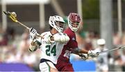 14 August 2022; Sean Loftus of Ireland in action against Ralfs Abols of Latvia during the 2022 World Lacrosse Men's U21 World Championship - Pool C match between Ireland and Latvia at University of Limerick. Photo by Tom Beary/Sportsfile