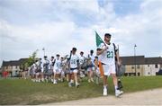 14 August 2022; Captain Matt Loftus of Ireland leads his team from the team base in Kilmurry Village to the match field prior to the 2022 World Lacrosse Men's U21 World Championship - Pool C match between Ireland and Latvia at University of Limerick. Photo by Tom Beary/Sportsfile