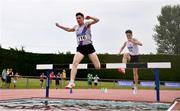 14 August 2022; Paul O'Donnell of Dundrum South Dublin AC, left, on his way to winning the premier men's 3000m steeplchase, ahead of Finlay Daly of Sligo AC, on his way to winning the division one men's 3000m steeplechase during the AAI National Outdoor League Final at Tullamore, Offaly. Photo by Sam Barnes/Sportsfile
