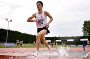 14 August 2022; Finlay Daly of Sligo AC, on his way to winning the division one men's 3000m steeplechase during the AAI National Outdoor League Final at Tullamore, Offaly. Photo by Sam Barnes/Sportsfile