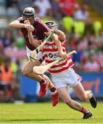 14 August 2022; Patrick O'Connor of St Martin's in action against Corey Byrne Dunbar of Ferns St Aidan's during the Wexford County Senior Hurling Championship Final match between St Martin's and Ferns St Aidan's at Chadwicks Wexford Park in Wexford. Photo by Ramsey Cardy/Sportsfile