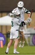 14 August 2022; Ben Collins, left, celebrates after scoring with Jack Galvin of Ireland during the 2022 World Lacrosse Men's U21 World Championship - Pool C match between Ireland and Latvia at University of Limerick. Photo by Tom Beary/Sportsfile
