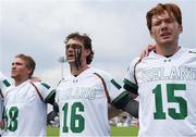 14 August 2022; Ireland players, from left, Conor Foley, Aidan Dempsey and Brady Morin during the national anthem prior to the 2022 World Lacrosse Men's U21 World Championship - Pool C match between Ireland and Latvia at University of Limerick. Photo by Tom Beary/Sportsfile