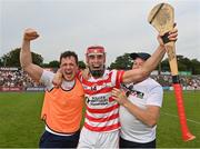 14 August 2022; Gavin Bailey, left, and Paul Morris of Ferns St Aidan's celebrate after the Wexford County Senior Hurling Championship Final match between St Martin's and Ferns St Aidan's at Chadwicks Wexford Park in Wexford. Photo by Ramsey Cardy/Sportsfile