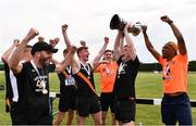 14 August 2022; Clonliffe Harriers AC captain Keith Pike lifts the premier men's trophy and celebrates with team-mates  during the AAI National Outdoor League Final at Tullamore, Offaly. Photo by Sam Barnes/Sportsfile