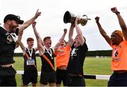 14 August 2022; Clonliffe Harriers AC captain  Keith Pike lifts the premier men's trophy and celebrates with team-mates  during the AAI National Outdoor League Final at Tullamore, Offaly. Photo by Sam Barnes/Sportsfile