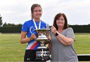 14 August 2022;  The Dundrum South Dublin AC captain Rachel Dunne is presented with the premier women's trophy by Athletics Ireland Road Running Coordinator Bernie Dunne during the AAI National Outdoor League Final at Tullamore, Offaly. Photo by Sam Barnes/Sportsfile