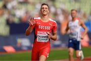 15 August 2022; Simon Ehammer of Switzerland celebrates after winning his Men's Decathlon 100m heat during day 5 of the European Championships 2022 at the Olympiastadion in Munich, Germany. Photo by Ben McShane/Sportsfile