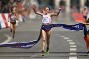 15 August 2022; Aleksandra Lisowska of Poland crosses the line to win the Women's Marathon during day 5 of the European Championships 2022 at the Odseonplatz in Munich, Germany. Photo by David Fitzgerald/Sportsfile