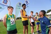 13 August 2022; Community Games ambassador Jesse Osas, right, with boys 100m U16 & O14 gold medallist Sylvester Onwudiwe from Ennis-St-Johns, Clare, during the Aldi Community Games National Track and Field Finals that attract over 2,000 children to SETU Carlow Sports Campus in Carlow. Photo by Ramsey Cardy/Sportsfile