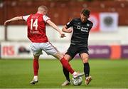 14 August 2022; Lewis Banks of Sligo Rovers in action against Mark Doyle of St Patrick's Athletic during the SSE Airtricity League Premier Division match between St Patrick's Athletic and Sligo Rovers at Richmond Park in Dublin. Photo by Seb Daly/Sportsfile