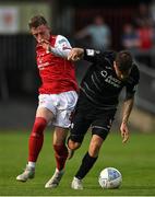 14 August 2022; Chris Forrester of St Patrick's Athletic in action against Frank Liivak of Sligo Rovers during the SSE Airtricity League Premier Division match between St Patrick's Athletic and Sligo Rovers at Richmond Park in Dublin. Photo by Seb Daly/Sportsfile