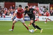 14 August 2022; Max Mata of Sligo Rovers in action against Joe Redmond of St Patrick's Athletic during the SSE Airtricity League Premier Division match between St Patrick's Athletic and Sligo Rovers at Richmond Park in Dublin. Photo by Seb Daly/Sportsfile