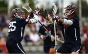 15 August 2022; Christopher Kirst, right, celebrates after scoring a goal with Alex Slusher of USA during the 2022 World Lacrosse Men's U21 World Championship - Pool A match between Australia and USA at University of Limerick. Photo by Tom Beary/Sportsfile