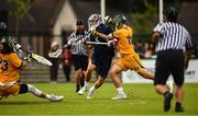 15 August 2022; Graham Bundy, JR. of USA is tackled by Sam Boontjes of Australia during the 2022 World Lacrosse Men's U21 World Championship - Pool A match between Australia and USA at University of Limerick. Photo by Tom Beary/Sportsfile
