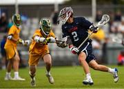 15 August 2022; Cole Kirst of USA is tackled by Dylan Harari of Australia during the 2022 World Lacrosse Men's U21 World Championship - Pool A match between Australia and USA at University of Limerick. Photo by Tom Beary/Sportsfile