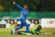 15 August 2022; Azmatullah Omarzai of Afghanistan celebrates after dismissing Simi Singh of Ireland during the Men's T20 International match between Ireland and Afghanistan at Stormont in Belfast. Photo by Ramsey Cardy/Sportsfile