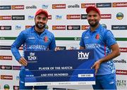 15 August 2022; Rashid Khan, left, and Farid Ahmad Malik of Afghanistan after the Men's T20 International match between Ireland and Afghanistan at Stormont in Belfast. Photo by Ramsey Cardy/Sportsfile