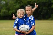 16 August 2022; Ukrainian refugees Anastasiia Rusnak, left, and Anastasiia Krasovska during the Bank of Ireland Leinster Rugby Summer Camp at DLSP RFC in Dublin. Photo by Harry Murphy/Sportsfile
