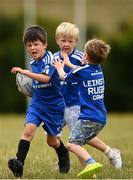 16 August 2022; Finn Hsu Casrol, left, during the Bank of Ireland Leinster Rugby Summer Camp at DLSP RFC in Dublin. Photo by Harry Murphy/Sportsfile