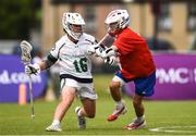 16 August 2022; Aidan Dempsey of Ireland is tackled by Martin Pech of Czech Republicduring the 2022 World Lacrosse Men's U21 World Championship - Play-in match between Ireland and Czech Republic at the University of Limerick in Limerick. Photo by Tom Beary/Sportsfile