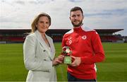 18 August 2022; SSE Airtricity Sponsorship and Marketing Manager, Leanne Sheill, presents the SSE Airtricity / SWI Player of the Month for July 2022 to Aidan Keena of Sligo Rovers at The Showgrounds in Sligo. Photo by Ramsey Cardy/Sportsfile