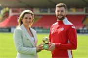 18 August 2022; SSE Airtricity Sponsorship and Marketing Manager, Leanne Sheill, presents the SSE Airtricity / SWI Player of the Month for July 2022 to Aidan Keena of Sligo Rovers at The Showgrounds in Sligo. Photo by Ramsey Cardy/Sportsfile