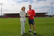18 August 2022; SSE Airtricity Sponsorship and Marketing Manager, Leanne Sheill, presents the SSE Airtricity / SWI Player of the Month for July 2022 to Aidan Keena of Sligo Rovers at The Showgrounds in Sligo. Photo by Ramsey Cardy/Sportsfile