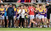 16 August 2022; Brian Cody, manager of Davy Russell's Best, watches on as Johnny Smack of Davy Russell's Best waves to the crowd during the Hurling for Cancer Research 2022 match at St Conleth's Park in Newbridge, Kildare. Photo by Stephen McCarthy/Sportsfile