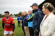 16 August 2022; Brian Cody, manager of Davy Russell's Best, watches on as Johnny B of Davy Russell's Best runs past during the Hurling for Cancer Research 2022 match at St Conleth's Park in Newbridge, Kildare. Photo by Stephen McCarthy/Sportsfile
