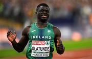 16 August 2022; Israel Olatunde of Ireland reacts after the men's 100m final, in which he finished in a new Irish record of 10.17sec, during day 6 of the European Championships 2022 at the Olympiastadion in Munich, Germany.  Photo by Ben McShane/Sportsfile