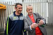 16 August 2022; Jockey Davy Russell stops for a photograph with Paul Hughes, from Drogheda, Louth, on his arrival for the Hurling for Cancer Research 2022 match at St Conleth's Park in Newbridge, Kildare. Photo by Stephen McCarthy/Sportsfile