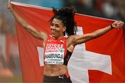 16 August 2022; Silver medallist medalist Mujinga Kambundji of Switzerland celebrates  after the women's 100m final during day 6 of the European Championships 2022 at the Olympiastadion in Munich, Germany. Photo by Ben McShane/Sportsfile