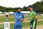 17 August 2022; Afghanistan captain Mohammad Nabi and Ireland captain Andrew Balbirnie shake hands before the Men's T20 International match between Ireland and Afghanistan at Stormont in Belfast. Photo by Harry Murphy/Sportsfile