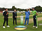 17 August 2022; Ireland captain Andrew Balbirnie tosses the coin watched by Afghanistan captain Mohammad Nabi and match referee Graham McCrea before the Men's T20 International match between Ireland and Afghanistan at Stormont in Belfast. Photo by Harry Murphy/Sportsfile