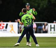 17 August 2022; Mark Adair of Ireland celebrates the wicket of Rahmanullah Gurbaz of Afghanistan with teammate George Dockrell during the Men's T20 International match between Ireland and Afghanistan at Stormont in Belfast. Photo by Harry Murphy/Sportsfile
